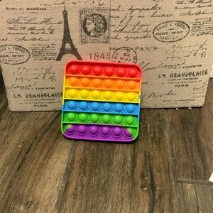 A rainbow square pop it